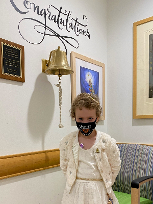 Harper ringing the bell at Children's Hospital in April 2021.